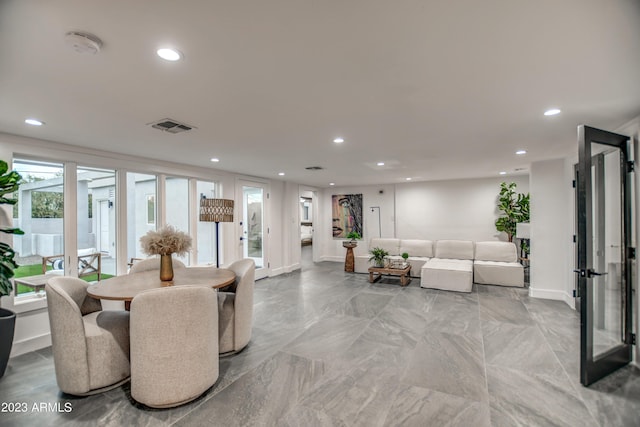 dining area featuring baseboards, visible vents, and recessed lighting