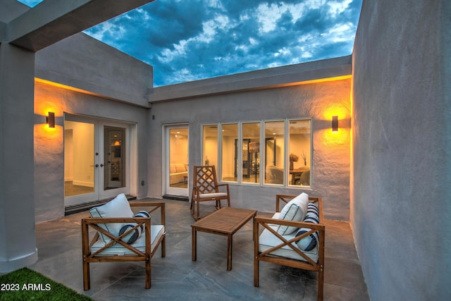 view of patio with french doors and an outdoor living space