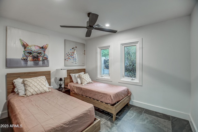 bedroom featuring a ceiling fan, recessed lighting, and baseboards