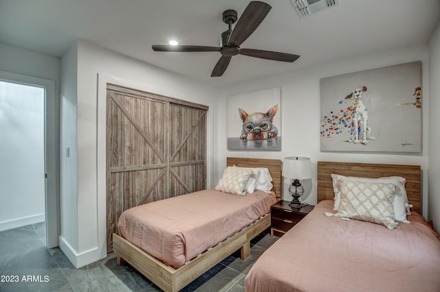 bedroom featuring visible vents, ceiling fan, and baseboards