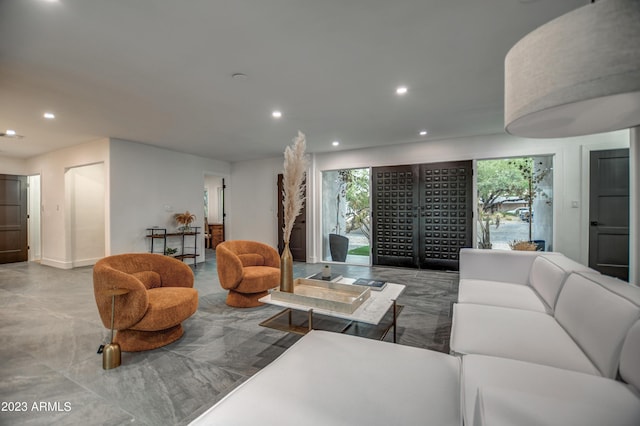 living area featuring recessed lighting