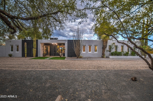 view of front of property featuring stucco siding