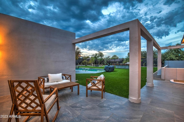 view of patio / terrace featuring fence