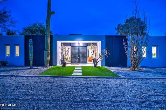 exterior space featuring stucco siding