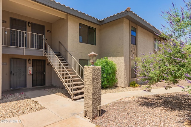 1402 E Guadalupe Rd Unit 234, Tempe, AZ 85283 - view of property featuring stairway