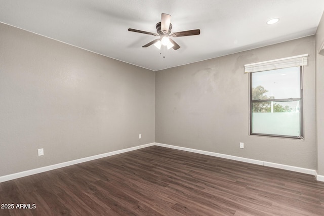 1402 E Guadalupe Rd Unit 234, Tempe, AZ 85283 - unfurnished room featuring ceiling fan, dark wood finished floors, baseboards, and recessed lighting