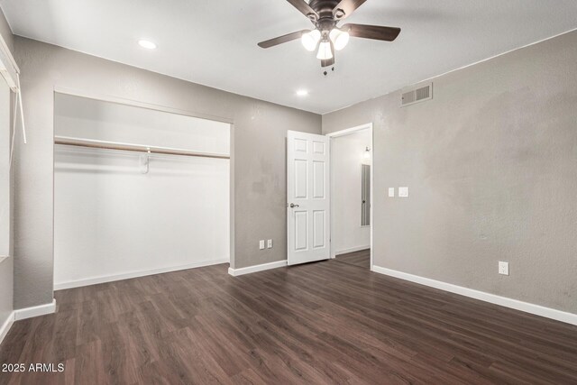 1402 E Guadalupe Rd Unit 234, Tempe, AZ 85283 - unfurnished bedroom with dark wood-style floors, baseboards, a closet, ceiling fan, and recessed lighting