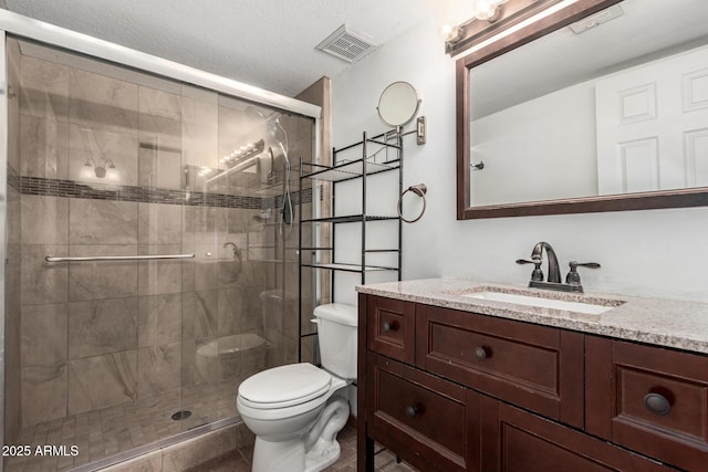 1402 E Guadalupe Rd Unit 234, Tempe, AZ 85283 - full bathroom featuring toilet, vanity, and a stall shower