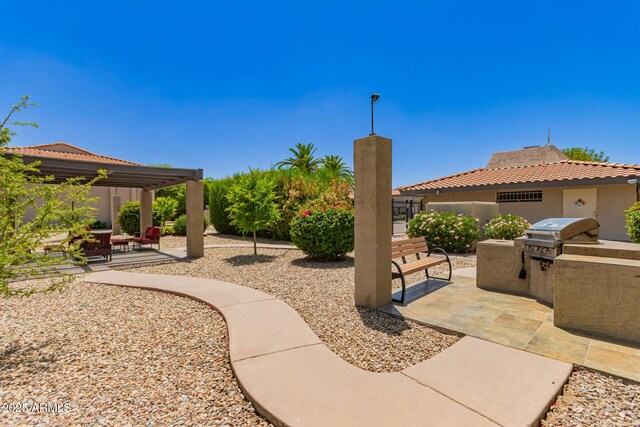 1402 E Guadalupe Rd Unit 234, Tempe, AZ 85283 - view of patio with a grill, area for grilling, and a pergola