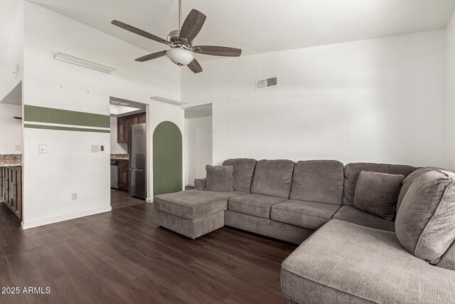 1402 E Guadalupe Rd Unit 234, Tempe, AZ 85283 - living room featuring dark wood finished floors, a ceiling fan, and baseboards