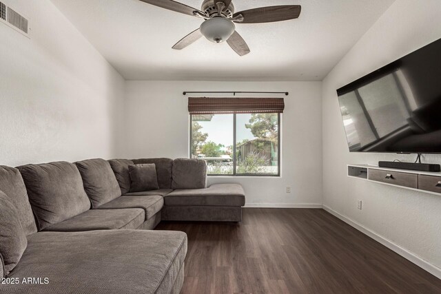 1402 E Guadalupe Rd Unit 234, Tempe, AZ 85283 - living room with dark wood-type flooring, ceiling fan, and baseboards