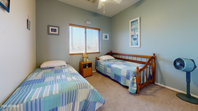 bedroom with ceiling fan and light colored carpet