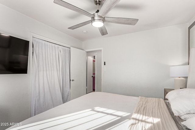 bedroom with a closet and ceiling fan