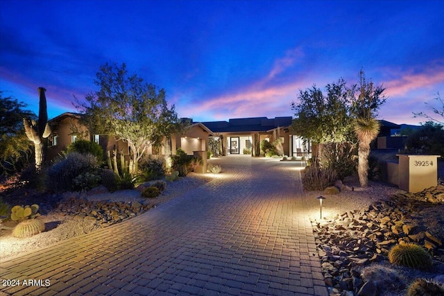 39254 N 104th Pl, Scottsdale, AZ 85262 - view of front facade featuring driveway and stucco siding