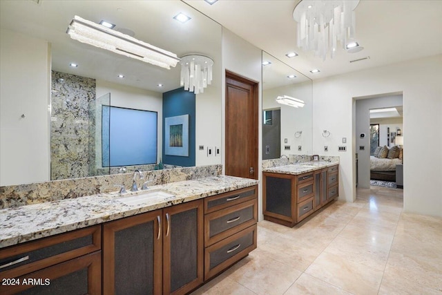 39254 N 104th Pl, Scottsdale, AZ 85262 - ensuite bathroom with two vanities, ensuite bathroom, a sink, and recessed lighting