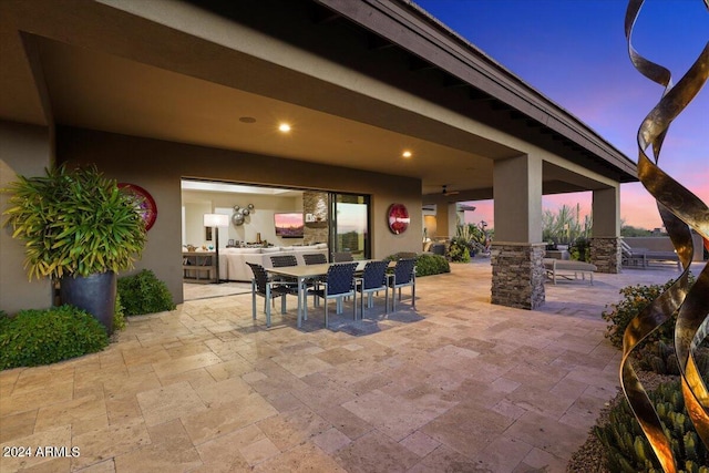 39254 N 104th Pl, Scottsdale, AZ 85262 - patio terrace at dusk featuring outdoor dining area