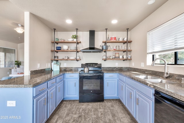 kitchen featuring wall chimney exhaust hood, light wood-type flooring, black appliances, open shelves, and a sink