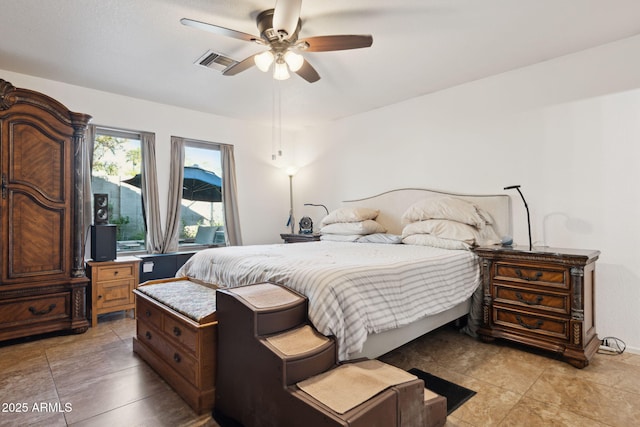 bedroom featuring light tile patterned floors, a ceiling fan, and visible vents