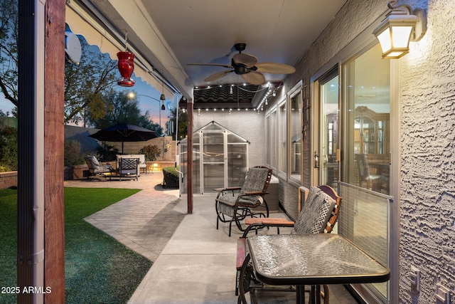 view of patio with a ceiling fan and fence private yard