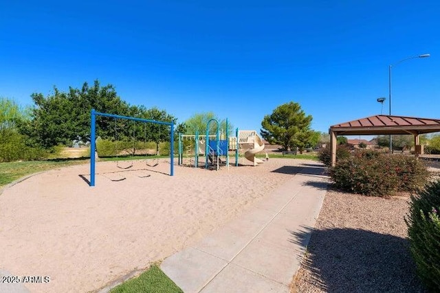view of home's community featuring playground community