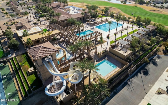 drone / aerial view featuring view of golf course