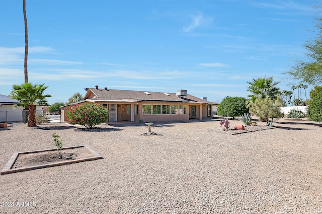 ranch-style house with a patio