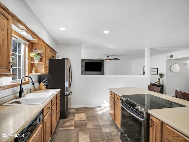 kitchen featuring dishwashing machine, sink, stainless steel electric stove, and ceiling fan