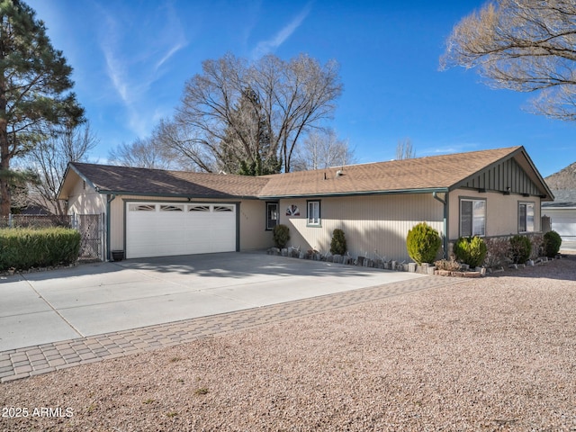 ranch-style house featuring a garage