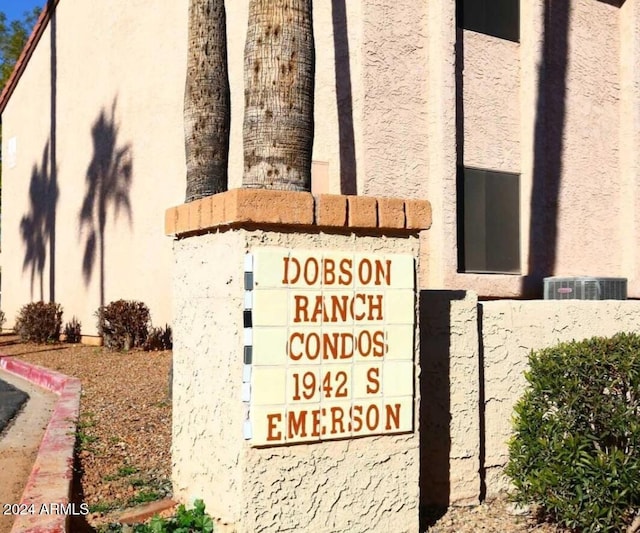 1942 S Emerson Unit 131, Mesa, AZ 85210 - exterior view of stucco siding and central air condition unit