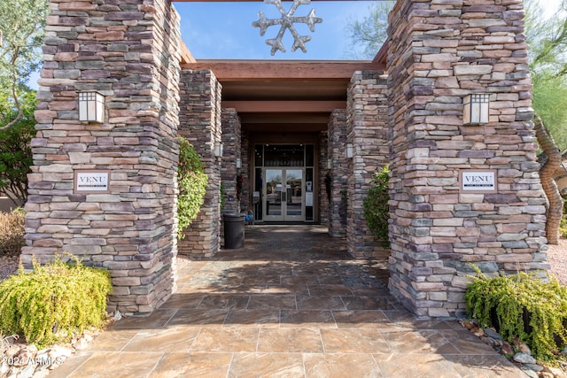 entrance to property featuring french doors