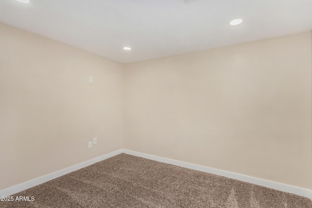 unfurnished room with carpet flooring