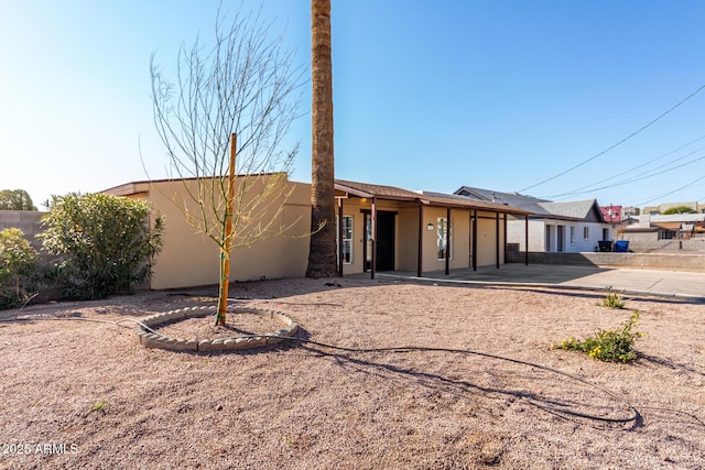 view of front of home featuring a patio area