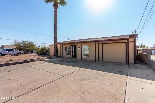 ranch-style house with a garage