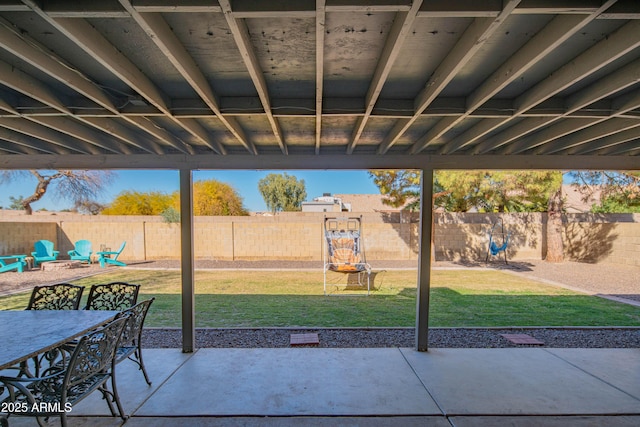 view of patio with an outdoor fire pit