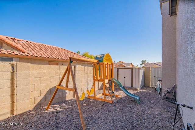 view of play area with a storage unit