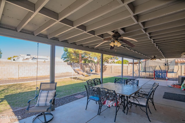 view of patio / terrace with a trampoline and ceiling fan