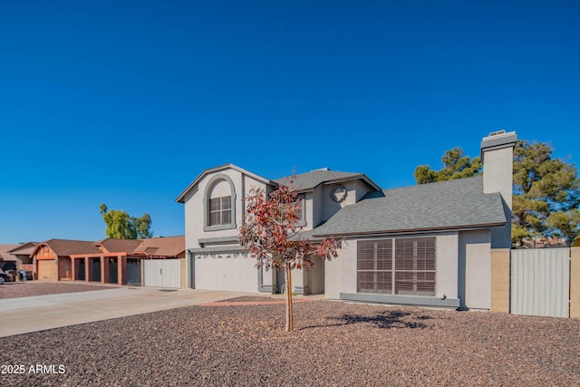 front of property featuring a garage