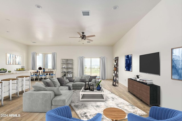 living area with visible vents, light wood-style flooring, and a ceiling fan