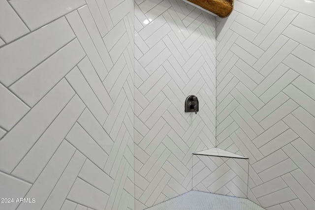 details with a tile shower