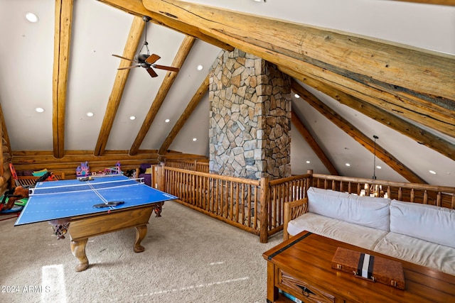 rec room featuring ceiling fan, vaulted ceiling with beams, and light colored carpet