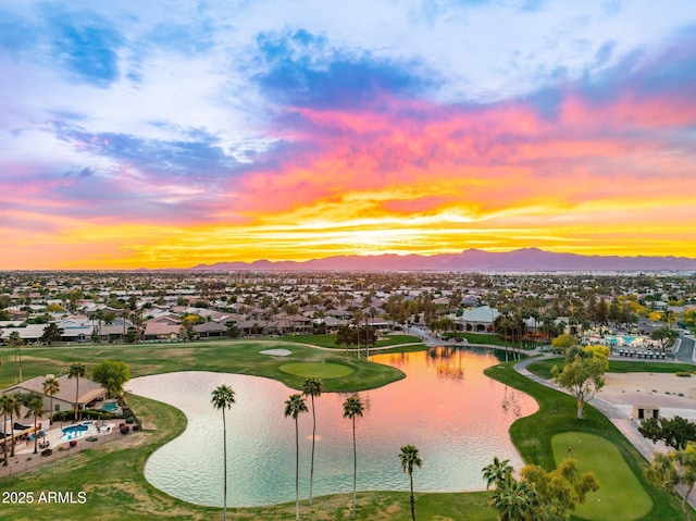 bird's eye view featuring a residential view, golf course view, and a water and mountain view