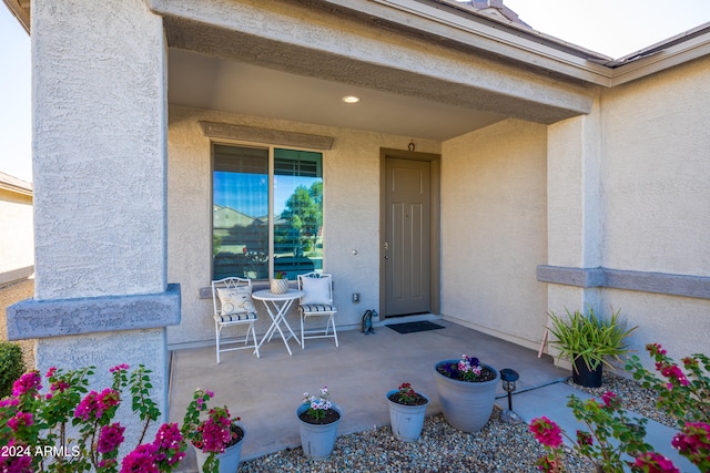 doorway to property featuring a porch