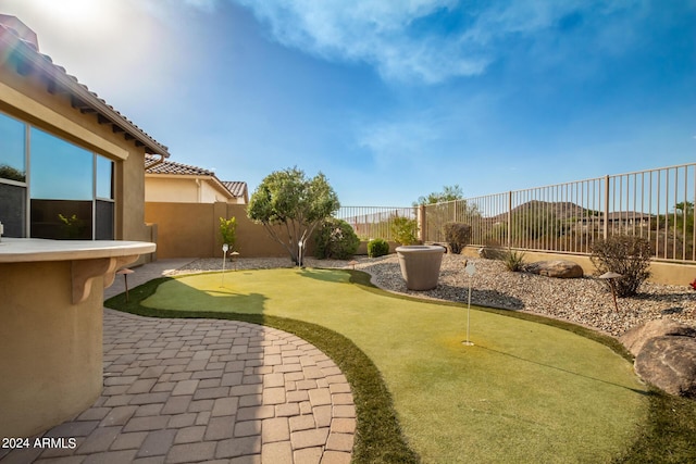 view of yard featuring a patio and a fenced backyard