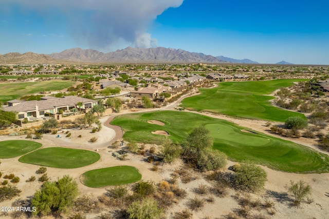 view of property's community featuring golf course view and a mountain view