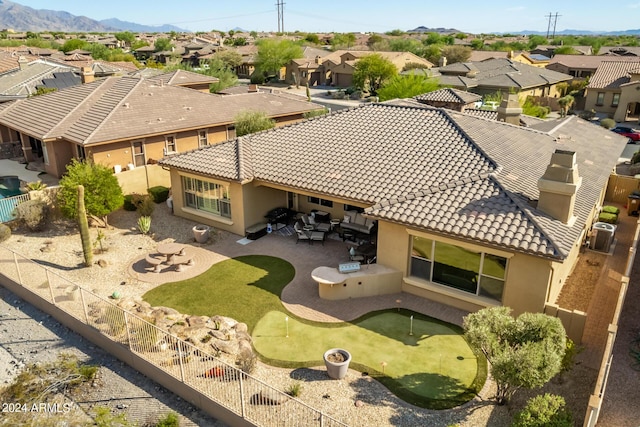 drone / aerial view with a mountain view and a residential view