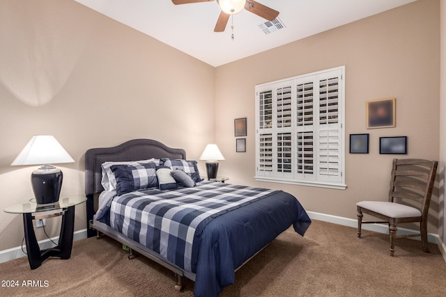 bedroom featuring visible vents, carpet flooring, a ceiling fan, and baseboards