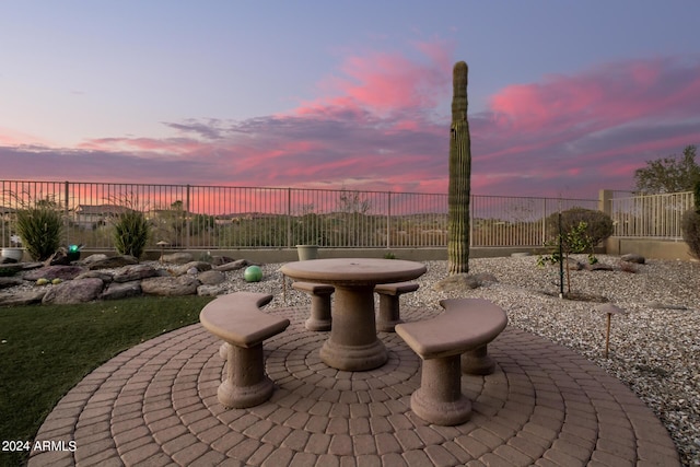 patio terrace at dusk with fence