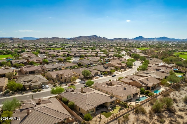 aerial view featuring a mountain view and a residential view