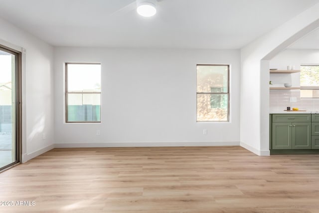 interior space featuring a healthy amount of sunlight and light hardwood / wood-style flooring