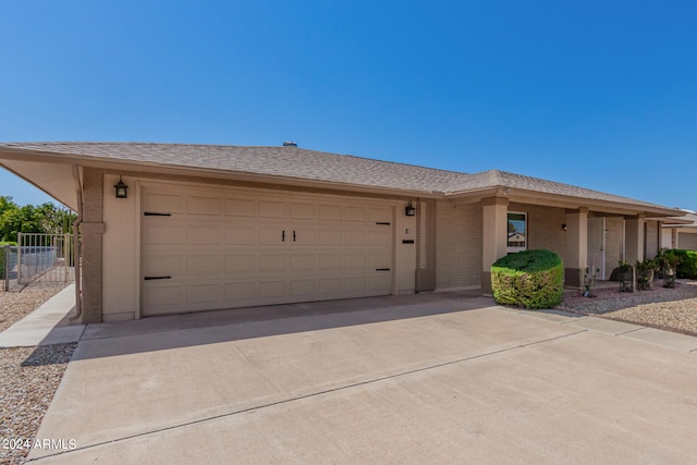 single story home featuring a garage